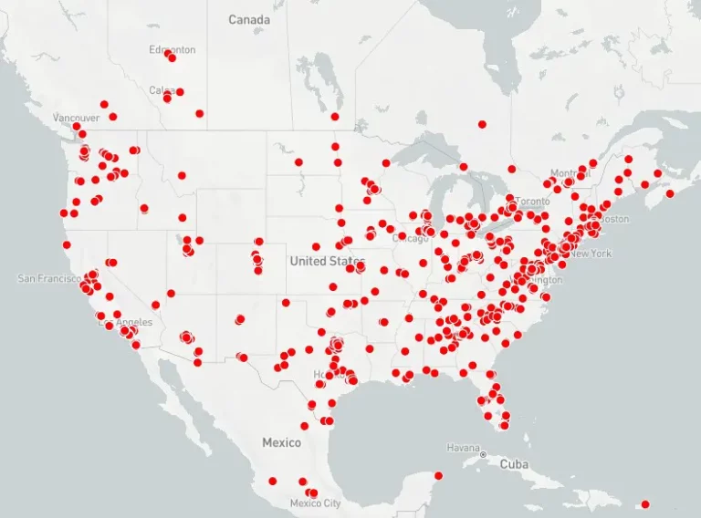 A visual representation of Data Centers in North America shown by red dots across a light gray map.