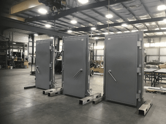 Gaven RF shielded and EMI shielded doors. Three metal shielded doors in manufacturing facility.