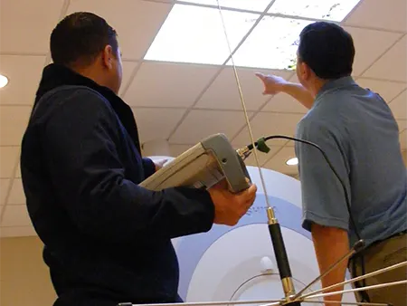 Gaven engineers testing electromagnetic shielding in MRI Room